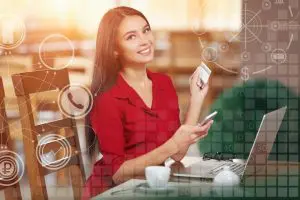 smiling woman with card mobile Digital Ware